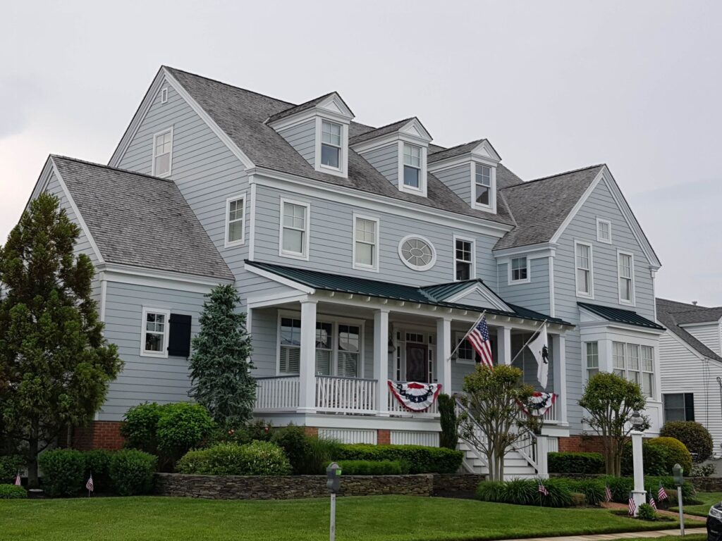 A tree-lined residential street in Middletown Township during summer
