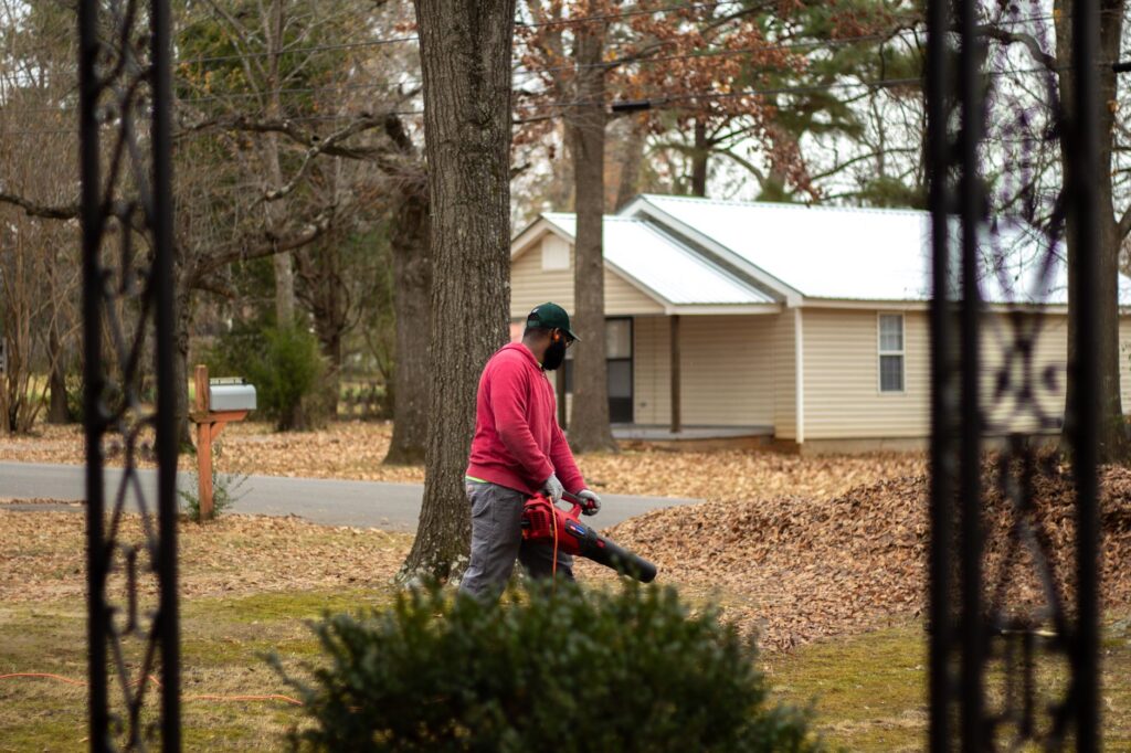Certified arborist consulting with a homeowner about a tree on their property